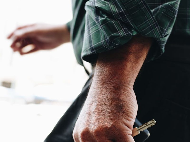 Person doing dynamic movements in a minimalist room.